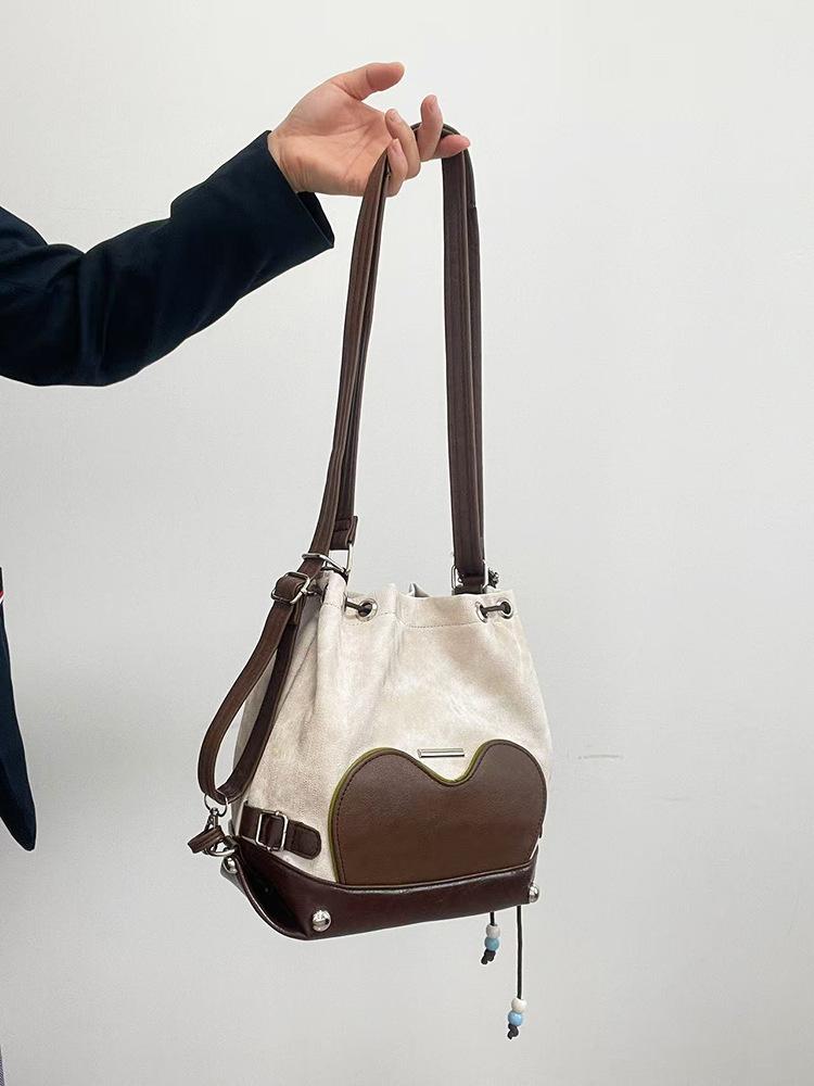 

2025 новый маленький рюкзак на шнурке, ощущение расслабленности, одно отделение, многоцелевая сумка-тоут, дизайн сумки-бродяги, сумка-ведро, женская бежевый