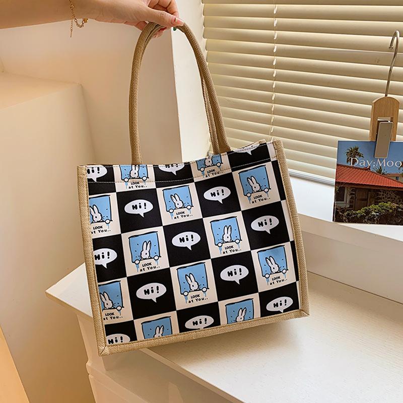 New Printed Large Capacity Fashionable Commuting Women's Bag for College Students In Class One-shoulder Tote Bag Handheld Cotton and Linen Bag Trend