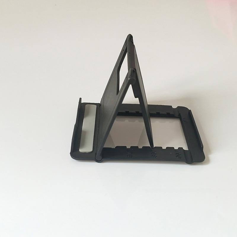 Folding Mobile Phone Holder Mini Adjustable Creative Portable Universal Folding Plastic Phone Holder Tablet Computer Stand For чёрный
