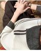 2026 Autumn-Winter Women's Striped Polo Collar Sweater: Versatile Knitwear for Layering