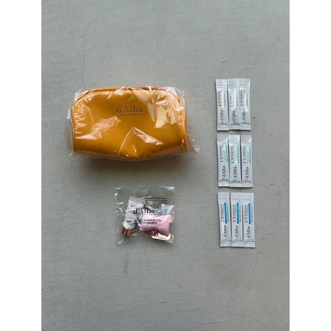 d Alba Yellow Pouch with UV Essence