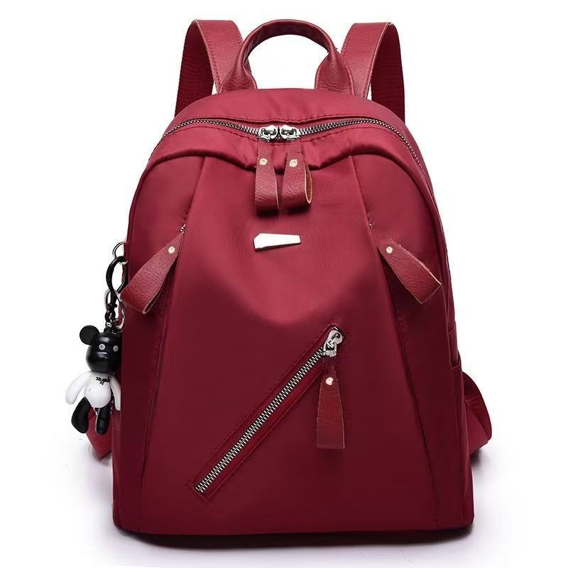 

Backpack fashion trend street Oxford cloth bag middle school student school bag backpack 27*13*32cm червоний