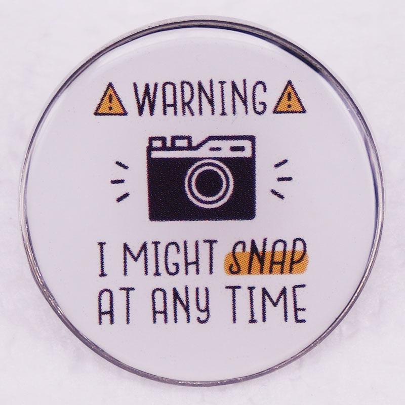 

Surprise Paparazzi Brooch: Prank Badge for Social Butterflies