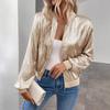 Women's Metallic Gold Short Puffer Jacket with White Sleeveless Top and Blue Denim Jeans, Casual Glamour Outfit