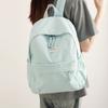 High-value solid-color backpack women's 2025 new college student schoolbag large-capacity lightweight short-distance travel backpack