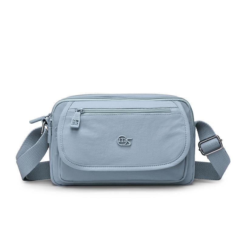 Kompaktní crossbody taška s více kapsami na zip pro muže a ženy