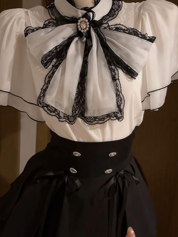 Completo due pezzi: Top in chiffon giapponese con maniche a tromba e gonna estiva attillata