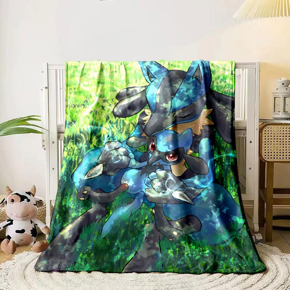

Shaded blue creatures with aura effects sit amidst vibrant grass. for all seasons blanket lunch break throw gift 80cm x 120cm