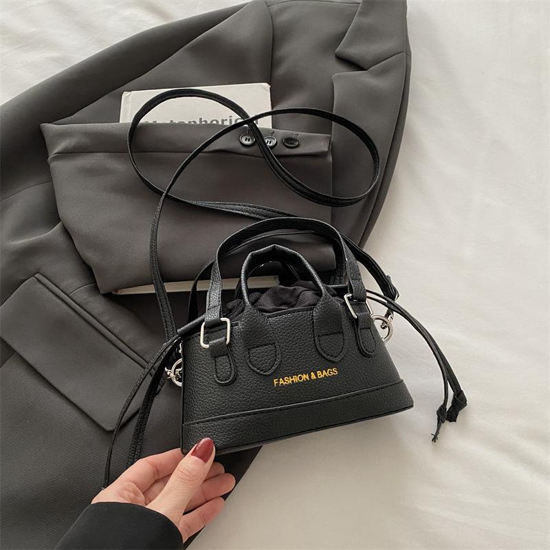 

В этом году новая модная женская сумка-сумка 2025 года, универсальная модная мини-сумка-ведро с завязками на плечо чёрный