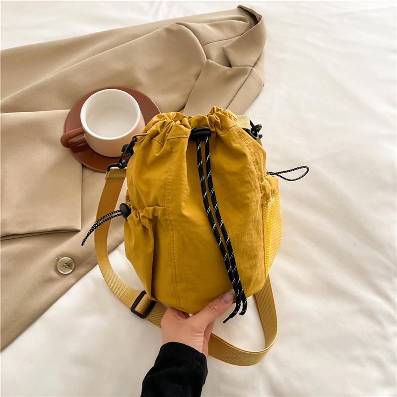 Wersja koreańska nowej torby ze sznurkiem damski trend mody na jedno ramię crossbody torba typu bucket na wyjścia casualowa przenośna torba na telefon