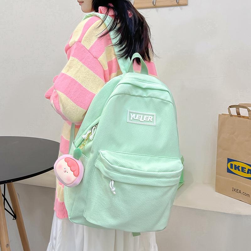 Student backpack Women's new large-capacity outdoor lightweight schoolbag Middle school student candy-colored backpack