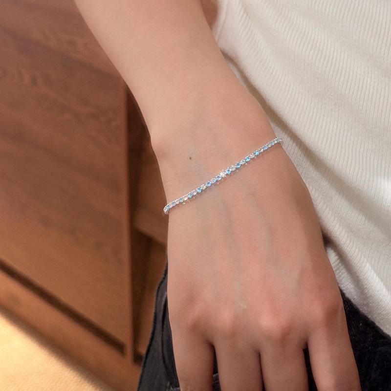Introducing the "Lake Blue Moonlight" Bracelet: Exquisitely Sparkly Blue and White Zirconia, Perfectly Versatile for Any Occasion.