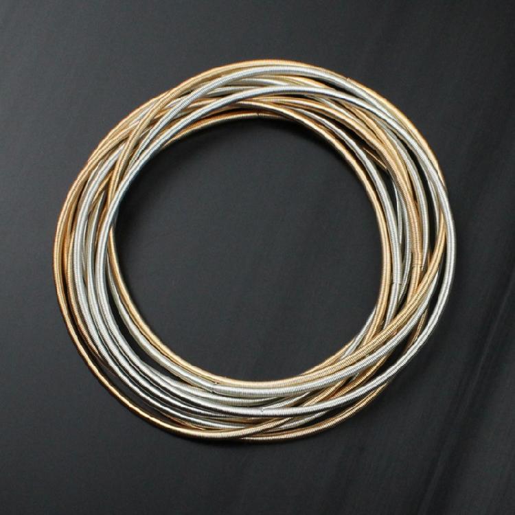 Infällbar Armband Kolstål Trådarmband Smycken Fjäderarmband Spolset