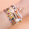 Set di Braccialetti Bohemien con Conchiglie Cowrie per Donna Colore Oro Stella Marina Charm Catena Multistrato di Perline Fatto a Mano Gioielli Estivi da Spiaggia Regalo