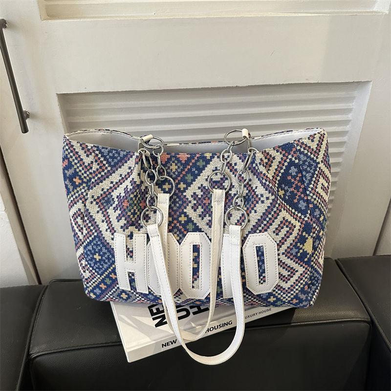 

Canvas bag women s large capacity 2025 new autumn and winter versatile ethnic style commuter tote bag textured shoulder handbag синий