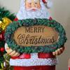 Santa Claus Resin Figurine with Merry Christmas Sign - Festive Home Decoration