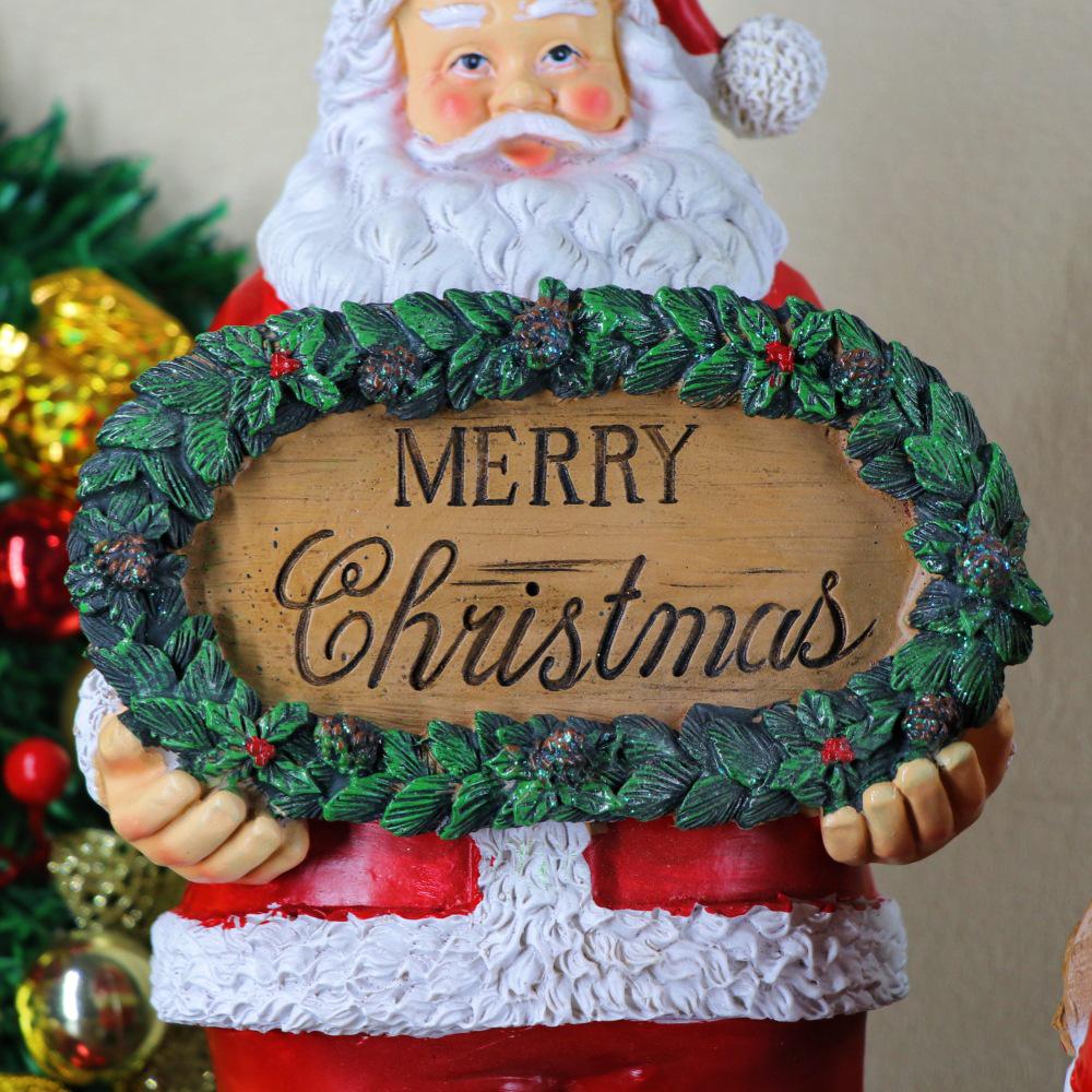 Santa Claus Resin Figurine with Merry Christmas Sign - Festive Home Decoration