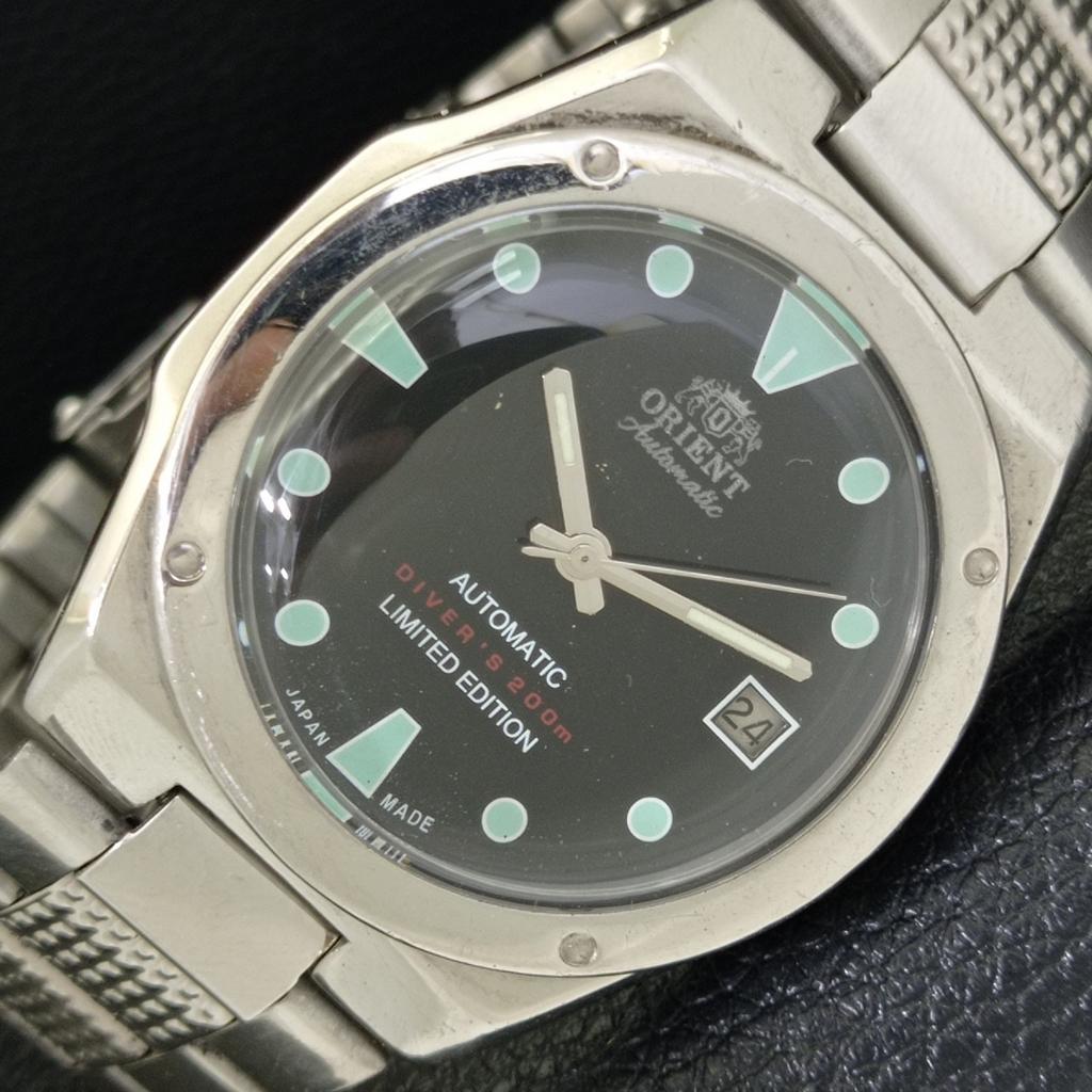 

GENUINE VINTAGE ORIENT AUTOMATIC 46941 JAPAN MENS BLACK DIAL WATCH a700737-5 R204-a700737