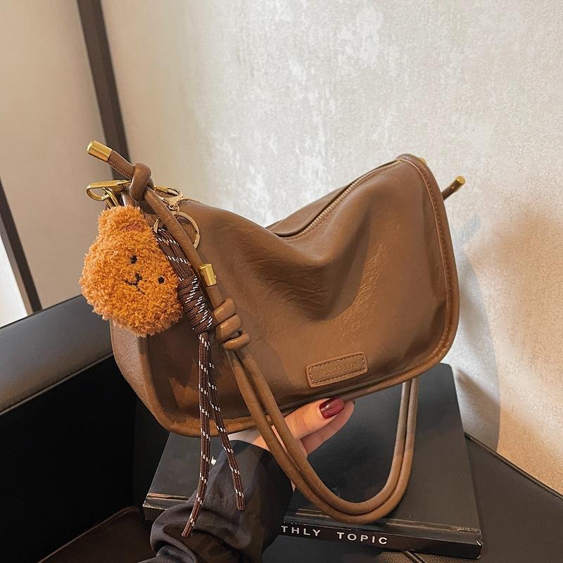 

Retro small bag women s 2024 autumn and winter new textured shoulder armpit bag fashionable versatile messenger pillow bag коричневий