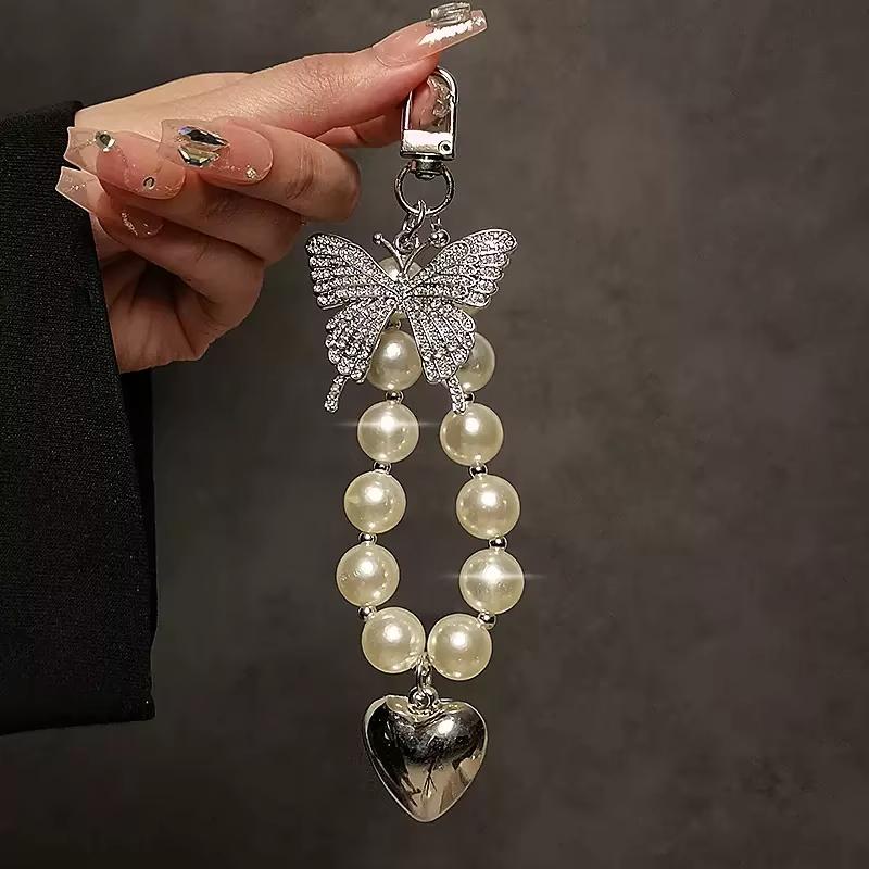 

INS Butterfly Pearl Beaded Keychain Bracelet Lanyard Phone Charm For iPhone Samsung Cute Love Heart Camera Anti-Lost Wrist Strap