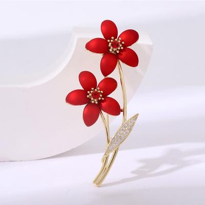 Die Pflaumenblüten-Brosche ist eine hochwertige, retro, elegante und exquisite Brosche mit einem Nischendesign.