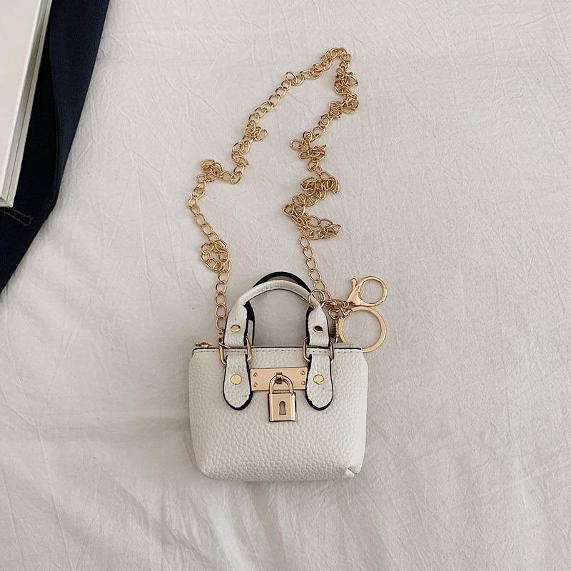 Korean version of girls' crossbody portable small square bag summer new personalized classic children's hand carry one shoulder crossbody bag