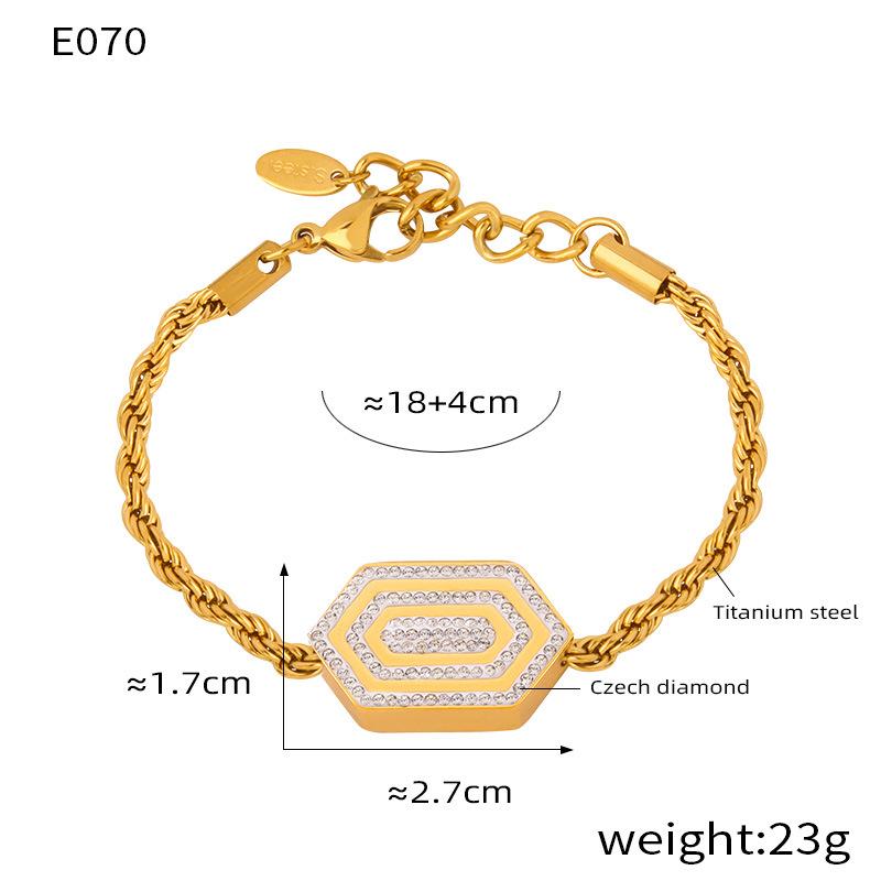 Meier Hexagonal pendant jewelry set - diamond-accented, designer titanium steel with gold plating