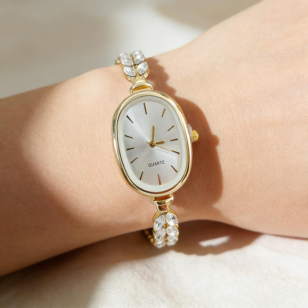 Elegante Damen-Gold-Diamant-Armbanduhr - Ovales Zifferblatt Quarz-Armbanduhr