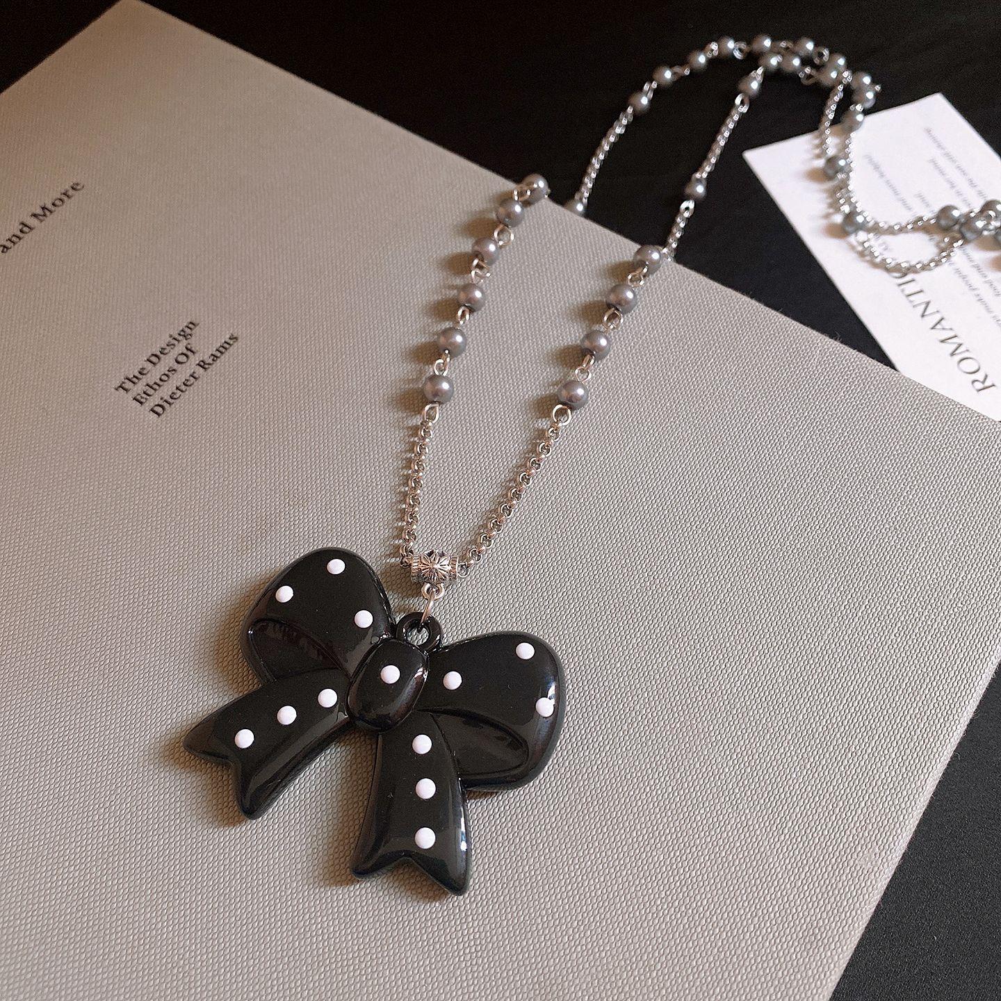 Korean simple polka dot love bow pendant necklace light luxury sweater chain versatile necklace women