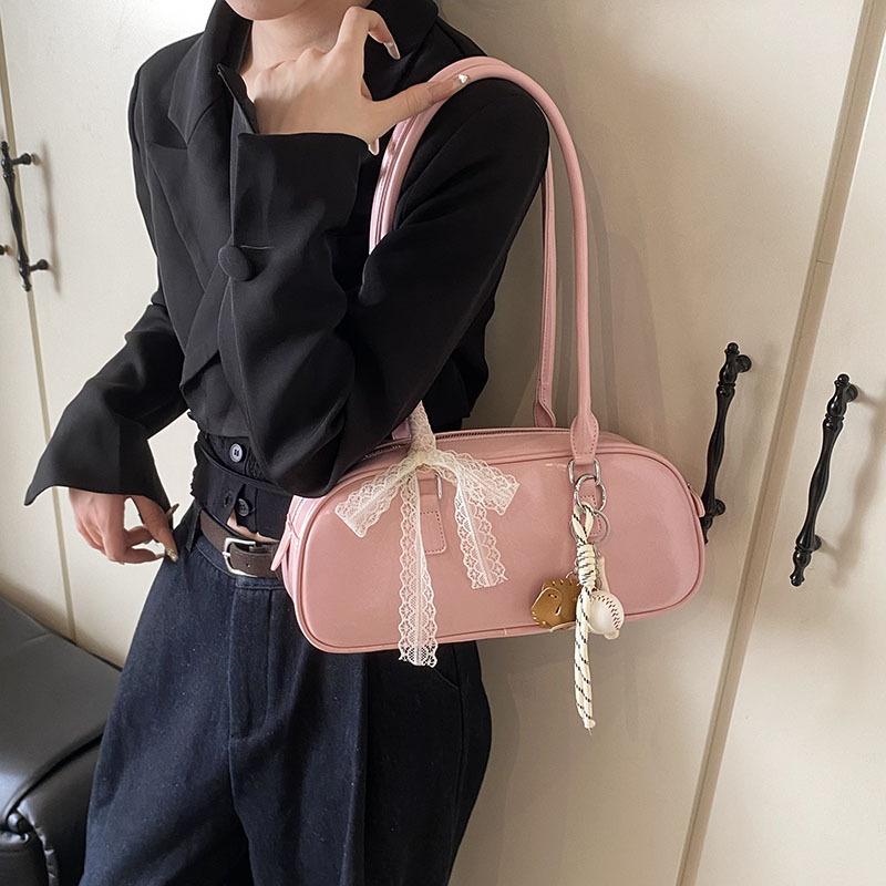 

Весенняя женская сумка ретро мода подмышечная сумка нишевая текстура подмышечная сумка простая повседневная сумка-багет With pendant розовый