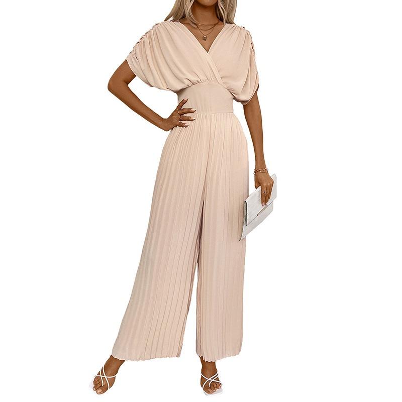 Kombinezon damski z dekoltem w serek i plisowanymi szerokimi nogawkami