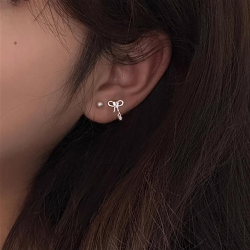 Korean version of exquisite bow stud earrings, ear holes, small love zircon earrings, earrings.