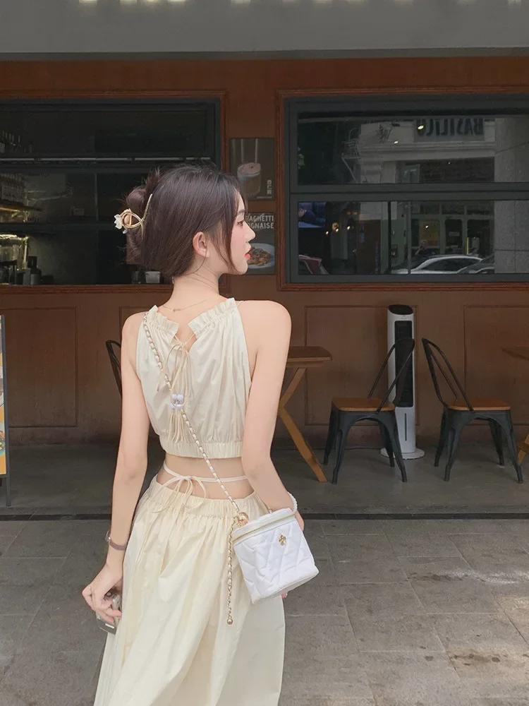 Damen Neckholder Quastenkleid: Hohle Taille, Bindegürtel, Slim Fit Langer Rock, Urlaubsstil.