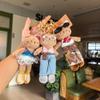 ארנקים למטבעות, פאוצ'ים ומחזיקים – מחזיקי מפתחות