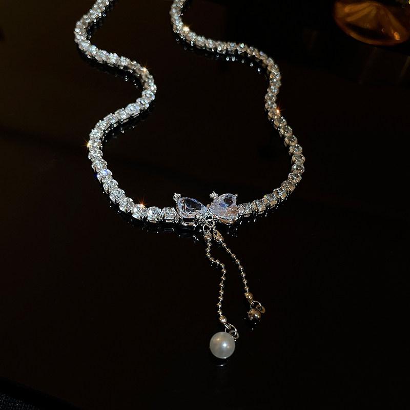 Korean Sweet Zircon Bow Heart Tassel Necklace: Elegant Light Luxury for Women