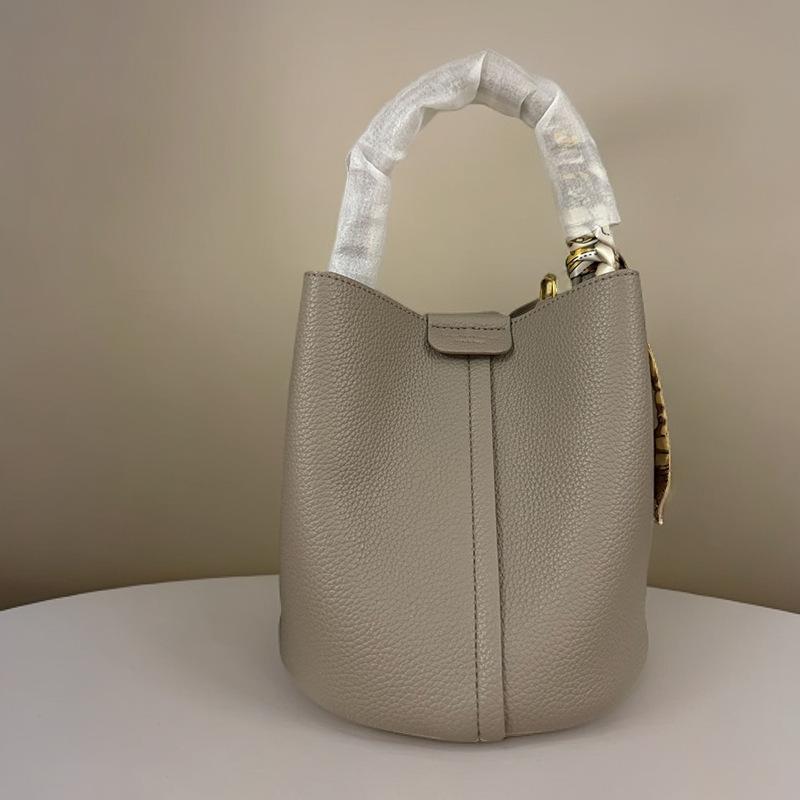 

Bag women s new leather bucket bag portable vegetable basket women s bag high-end sense large-capacity shoulder messenger bag