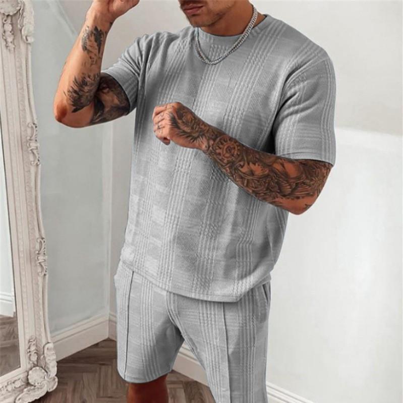 

Комплект из двух предметов: шорты с коротким рукавом. Спортивный и модный повседневный мужской спортивный костюм. M серый