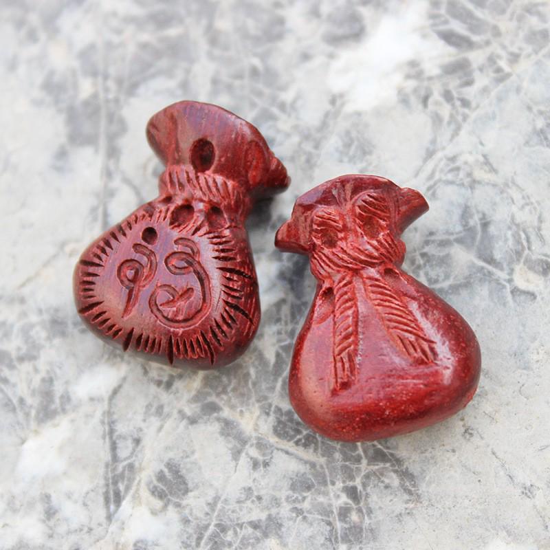 

Hand-Carved Blood Sandalwood Lucky Bag Pendant - DIY Jewelry Accessory