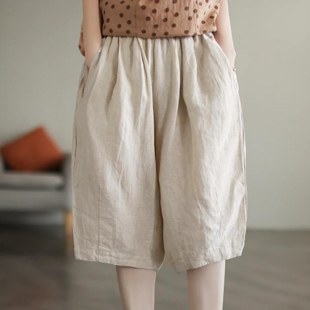 Pantaloni semplici casual da donna estivi in cotone e lino retrò letterario a tinta unita con elastico in vita taglia grande pantaloni a cinque punti