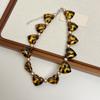 Artisanal Leopard Inspired Heart Jewelry Acrylic Pearls Chain Contemporary Design For Fashion Forward Women