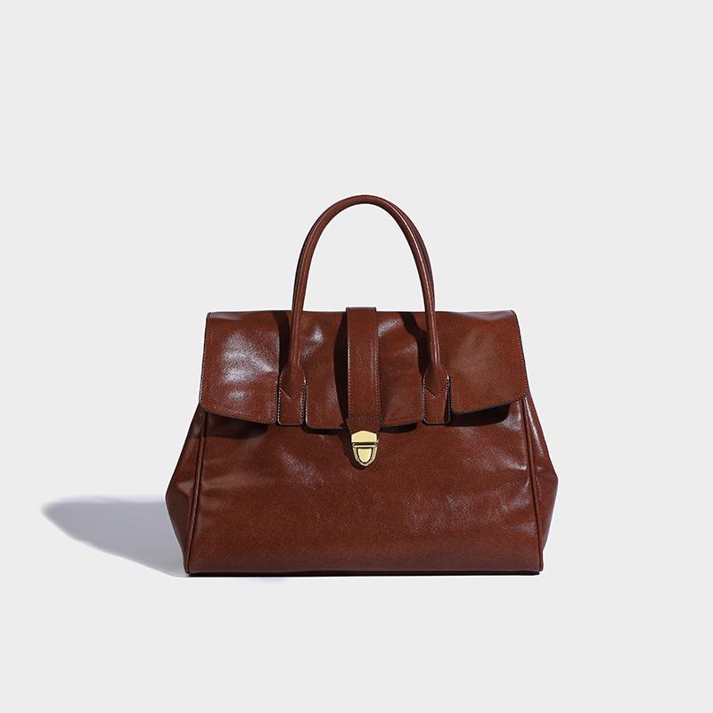 Luxury Women's Briefcase Designer Bag and Bag New In PU Leather Vintage Simple Large Capacity Lock Displacement Lady Tote