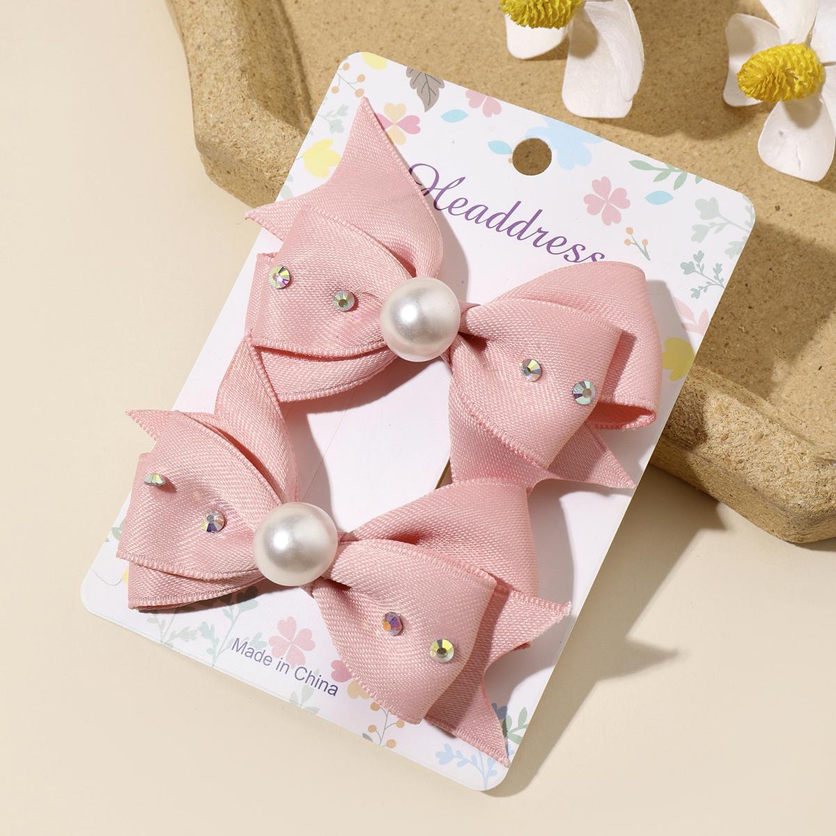 

2 шт. Новые милые модные заколки для волос принцессы с однотонным жемчужным бантом, милые детские заколки для волос, детские головные уборы, зажим для волос, заколки для волос, аксессуары для волос, подарок