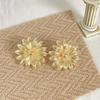 Retro style metal daisy earrings, gold three-dimensional petal stud earrings, fashionable personalized earrings.