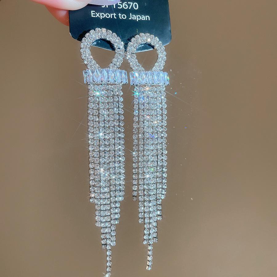 Silver Needle Water Drop Tassel Earrings - Light Luxury High-End Design for Women's Fashion.