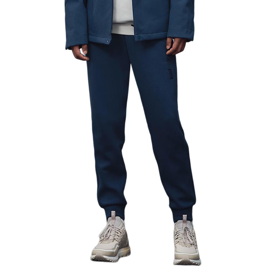 adidas Spodnie sportowe dzianinowe Wuji z logo w jednolitym kolorze Męskie doły Granatowy IP4906