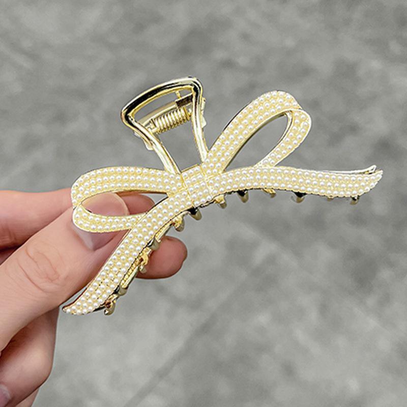 

Elegant Korean Pearl Bow Hair Clip - Large Shark Style