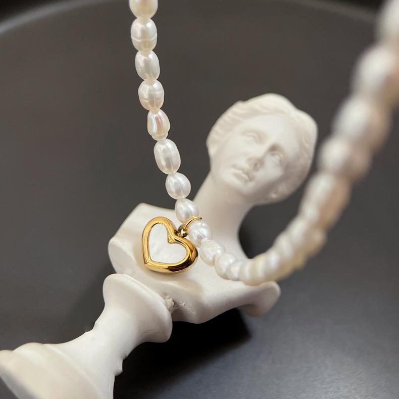 

Подвеска-сердце с покрытием из 18-каратного золота с белым перламутром и жемчугом