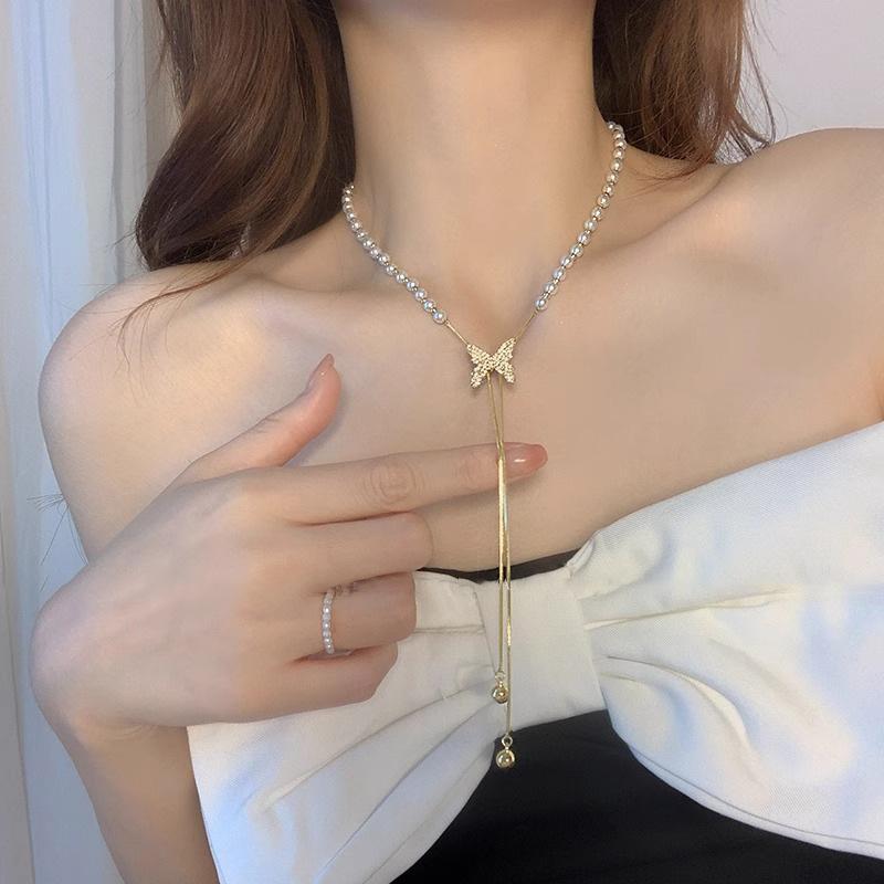 Sweet Premium Pearl Splicing Butterfly Tassel Pearl Necklace Female Pulling Adjustable Fashion Summer Collarbone Chain