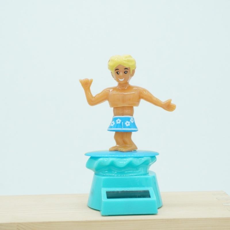 

Creative Summer Beach Surfing Muscle Boys Solar Toys Funny Swinging Dancing Boy Car Decoration Ornament Children Solar Toy