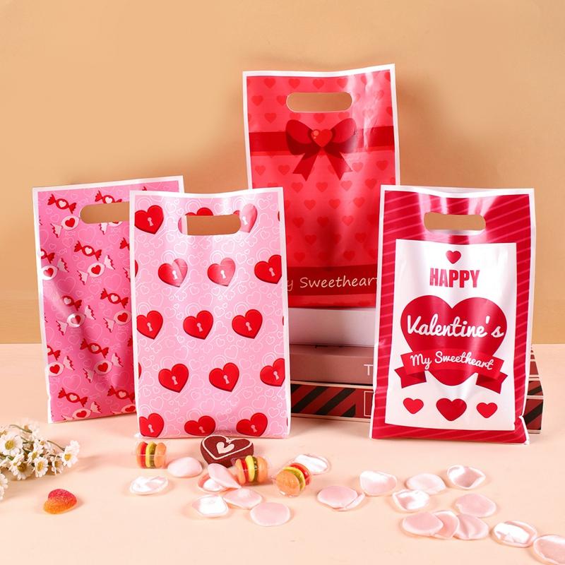 50pcs Pink Heart Valentine's Day Plastic Gift Bags Candy Bags For Valentine's Day Party Favor Wedding Decor And Party Suppllies